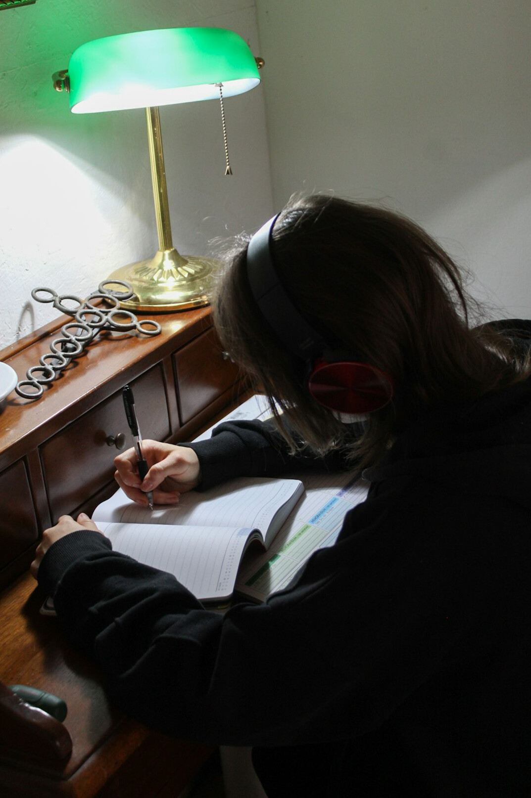 writer at desk with notebook