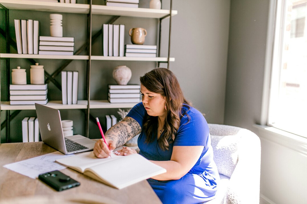 mystery author writing at desk